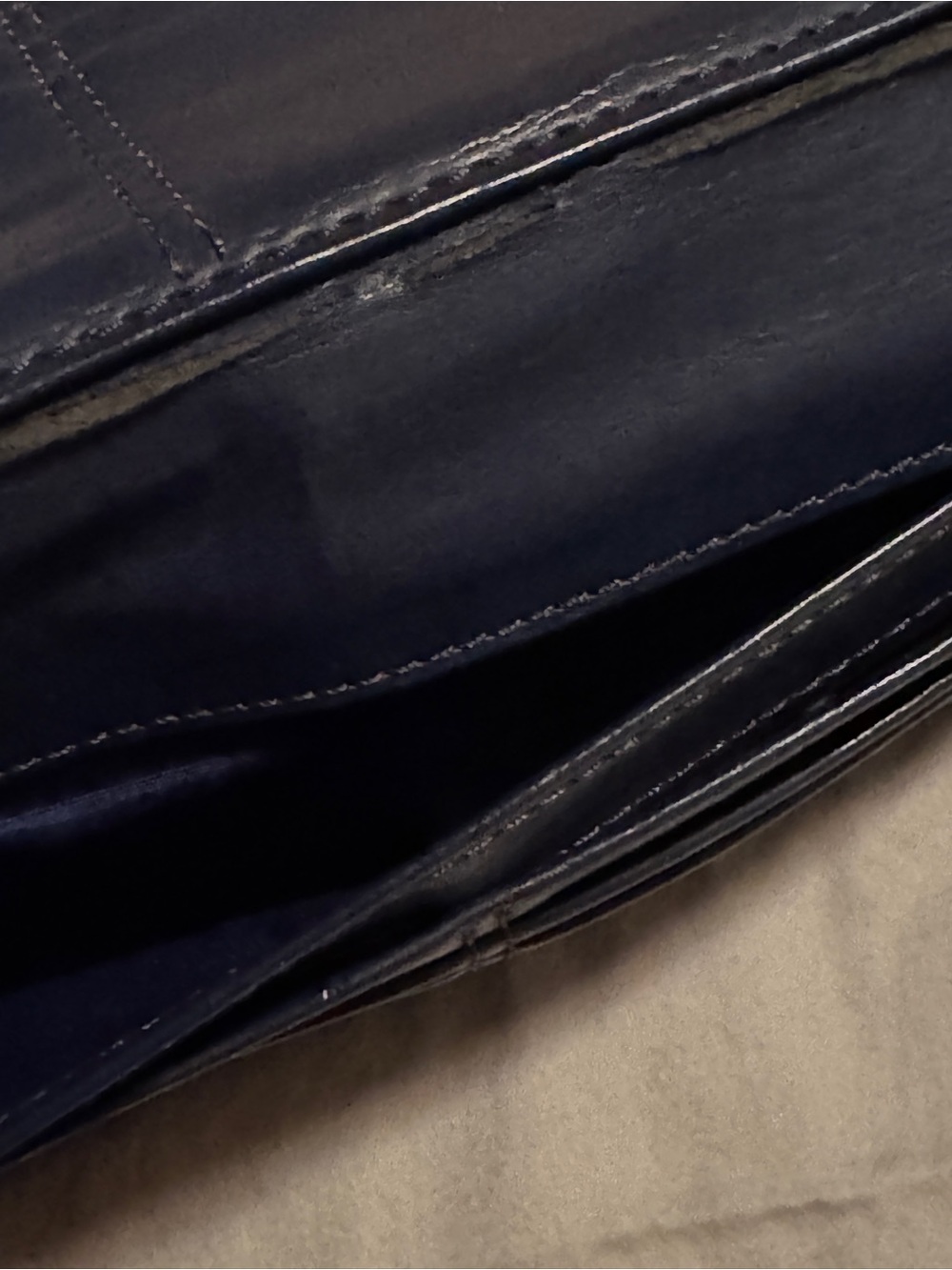 A Coach Plaid Trifold Wallet with Decorative Silver Signature Medallion - Picture 8 of 11